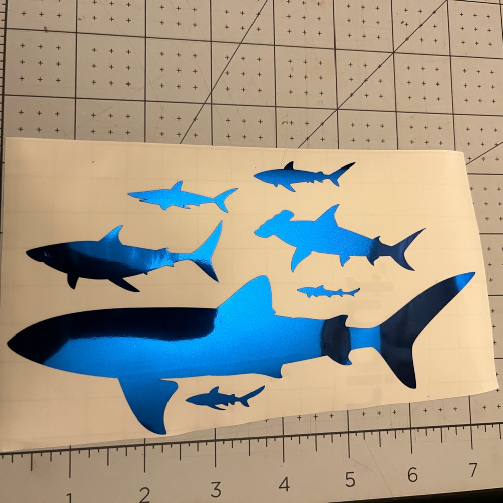 Cricut adhesive foil decals. Sharks are all 1 color BLUE.